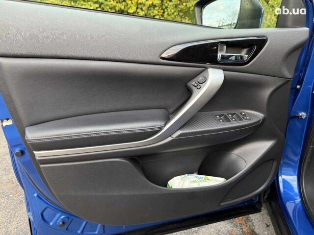 Синій Міцубісі Екліпс, об'ємом двигуна 2 л та пробігом 85 тис. км за 22990 $, фото 14 на Automoto.ua