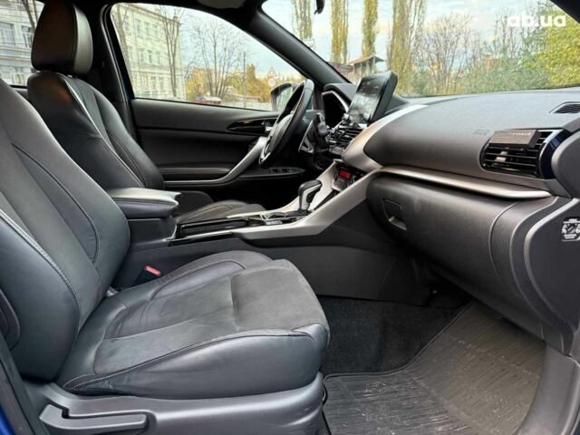 Синій Міцубісі Екліпс, об'ємом двигуна 2 л та пробігом 85 тис. км за 22990 $, фото 28 на Automoto.ua