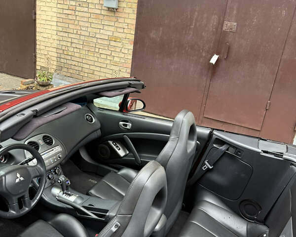 Оранжевый Мицубиси Эклипс, объемом двигателя 2.38 л и пробегом 97 тыс. км за 7500 $, фото 18 на Automoto.ua