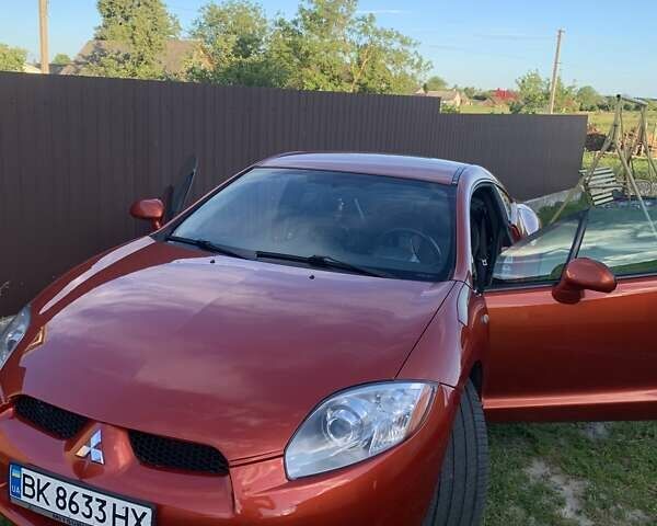 Оранжевый Мицубиси Эклипс, объемом двигателя 2.4 л и пробегом 120 тыс. км за 6500 $, фото 2 на Automoto.ua