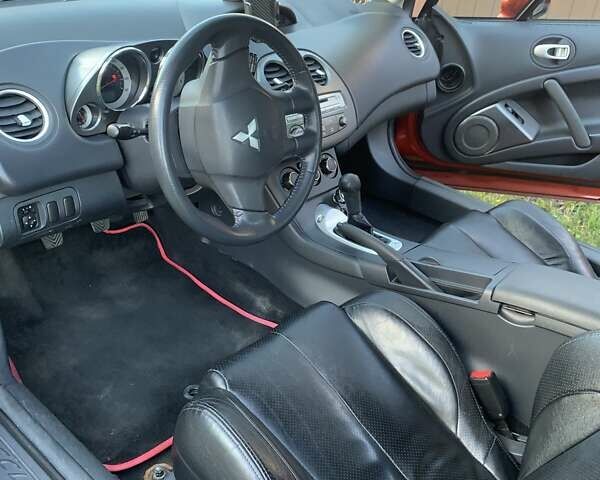 Оранжевый Мицубиси Эклипс, объемом двигателя 2.4 л и пробегом 120 тыс. км за 6500 $, фото 6 на Automoto.ua