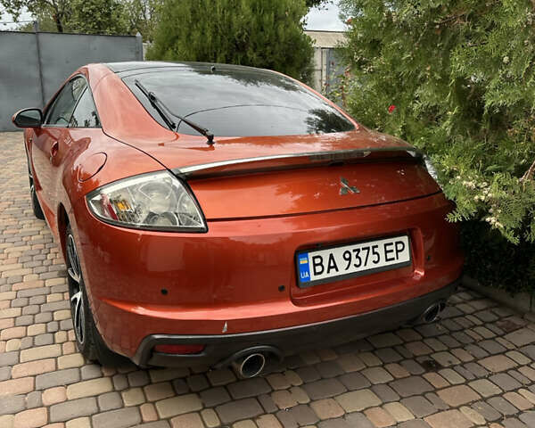 Помаранчевий Міцубісі Екліпс, об'ємом двигуна 2.38 л та пробігом 290 тис. км за 7600 $, фото 5 на Automoto.ua