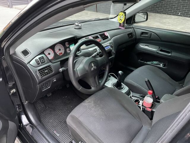 Черный Мицубиси Этерна, объемом двигателя 1.6 л и пробегом 302 тыс. км за 3900 $, фото 7 на Automoto.ua