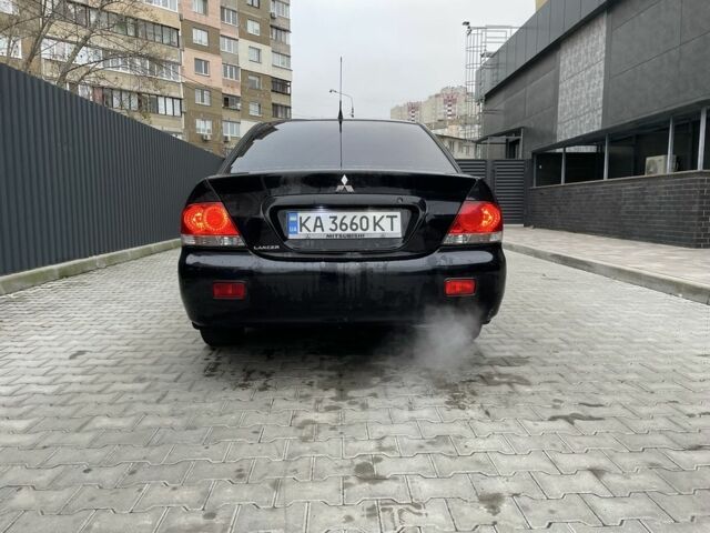 Черный Мицубиси Этерна, объемом двигателя 1.6 л и пробегом 302 тыс. км за 3900 $, фото 4 на Automoto.ua