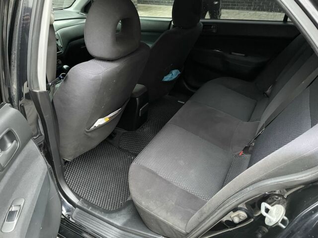 Черный Мицубиси Этерна, объемом двигателя 1.6 л и пробегом 302 тыс. км за 3900 $, фото 6 на Automoto.ua