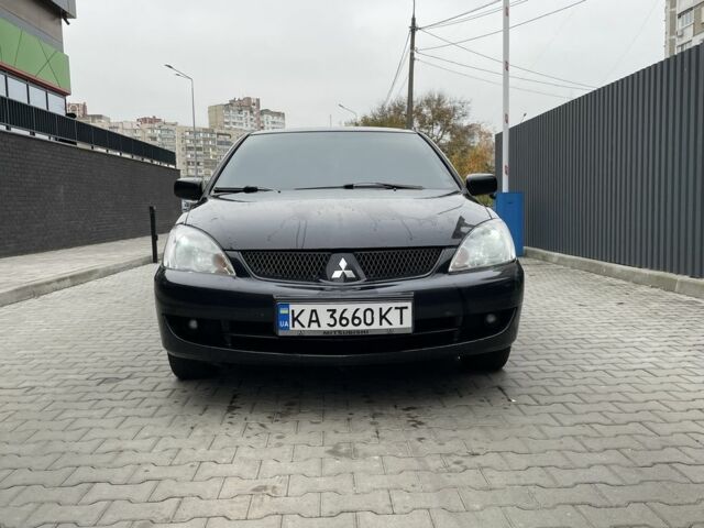 Черный Мицубиси Этерна, объемом двигателя 1.6 л и пробегом 302 тыс. км за 3900 $, фото 2 на Automoto.ua