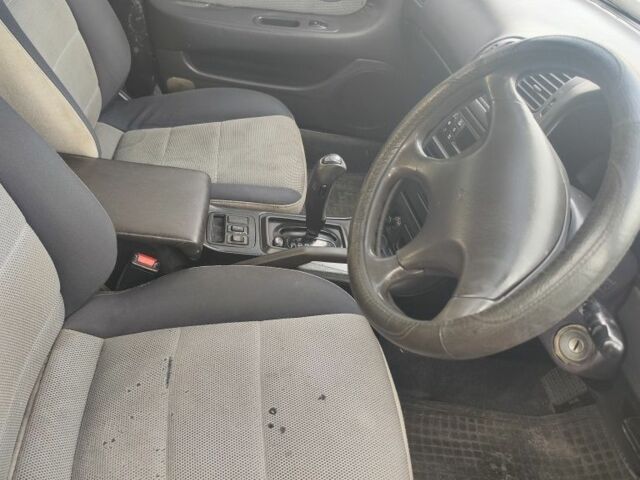 Серый Мицубиси Этерна, объемом двигателя 2 л и пробегом 172 тыс. км за 800 $, фото 2 на Automoto.ua