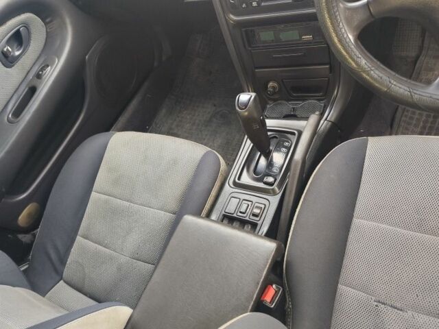 Серый Мицубиси Этерна, объемом двигателя 2 л и пробегом 172 тыс. км за 800 $, фото 3 на Automoto.ua