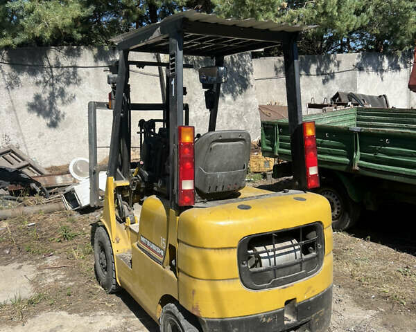 Желтый Мицубиси ФД, объемом двигателя 2 л и пробегом 3 тыс. км за 10100 $, фото 3 на Automoto.ua