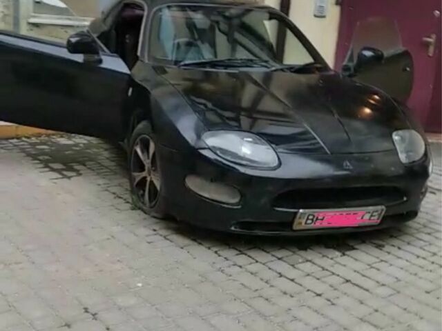 Черный Мицубиси ФТО, объемом двигателя 2 л и пробегом 680 тыс. км за 7500 $, фото 2 на Automoto.ua