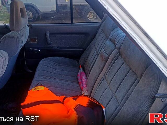 Белый Мицубиси Галант, объемом двигателя 2 л и пробегом 200 тыс. км за 620 $, фото 1 на Automoto.ua