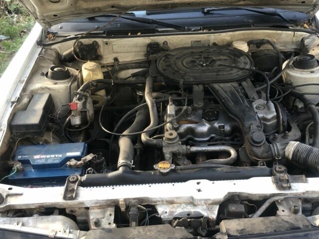 Белый Мицубиси Галант, объемом двигателя 1.8 л и пробегом 386 тыс. км за 1200 $, фото 11 на Automoto.ua