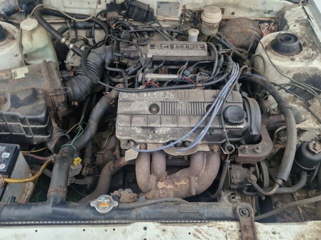 Белый Мицубиси Галант, объемом двигателя 2 л и пробегом 450 тыс. км за 1100 $, фото 2 на Automoto.ua