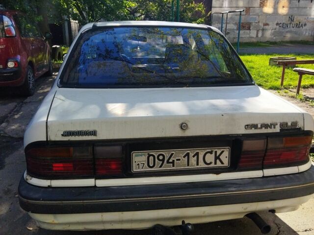 Белый Мицубиси Галант, объемом двигателя 2 л и пробегом 273 тыс. км за 650 $, фото 2 на Automoto.ua