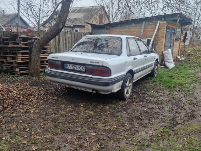 Белый Мицубиси Галант, объемом двигателя 2 л и пробегом 450 тыс. км за 1100 $, фото 5 на Automoto.ua