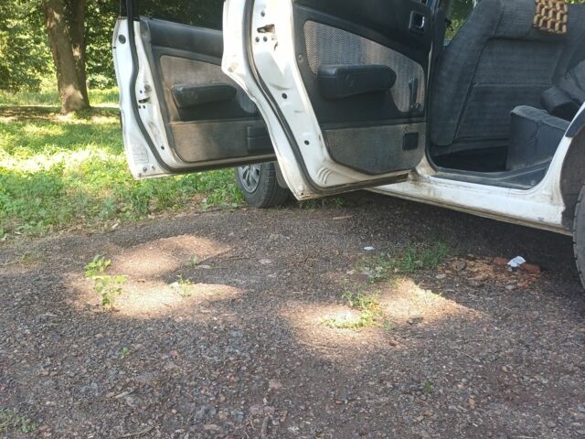 Белый Мицубиси Галант, объемом двигателя 1.8 л и пробегом 447 тыс. км за 1200 $, фото 3 на Automoto.ua