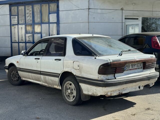 Белый Мицубиси Галант, объемом двигателя 2 л и пробегом 200 тыс. км за 700 $, фото 3 на Automoto.ua