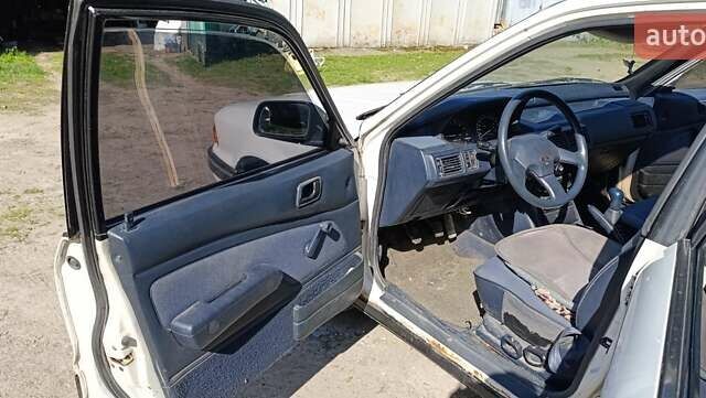 Белый Мицубиси Галант, объемом двигателя 1.76 л и пробегом 407 тыс. км за 1500 $, фото 1 на Automoto.ua