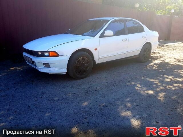 Белый Мицубиси Галант, объемом двигателя 2 л и пробегом 200 тыс. км за 1750 $, фото 7 на Automoto.ua