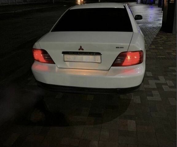 Білий Міцубісі Галант, об'ємом двигуна 2.4 л та пробігом 300 тис. км за 1400 $, фото 2 на Automoto.ua