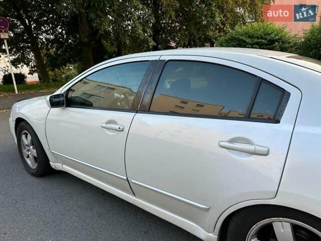 Белый Мицубиси Галант, объемом двигателя 2.35 л и пробегом 200 тыс. км за 4000 $, фото 37 на Automoto.ua