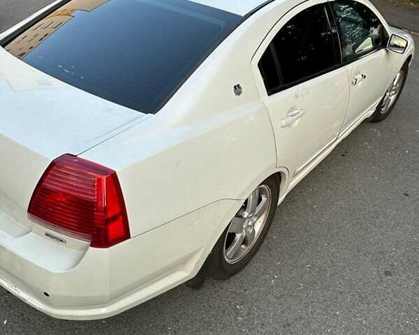 Белый Мицубиси Галант, объемом двигателя 2.35 л и пробегом 200 тыс. км за 4000 $, фото 13 на Automoto.ua