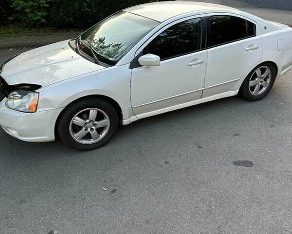 Белый Мицубиси Галант, объемом двигателя 2.35 л и пробегом 200 тыс. км за 4000 $, фото 1 на Automoto.ua