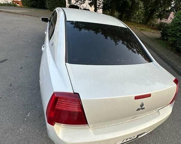 Белый Мицубиси Галант, объемом двигателя 2.35 л и пробегом 200 тыс. км за 4000 $, фото 22 на Automoto.ua
