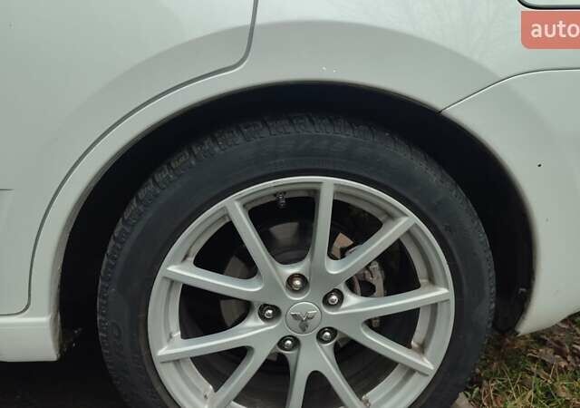 Белый Мицубиси Галант, объемом двигателя 2.4 л и пробегом 205 тыс. км за 7555 $, фото 20 на Automoto.ua