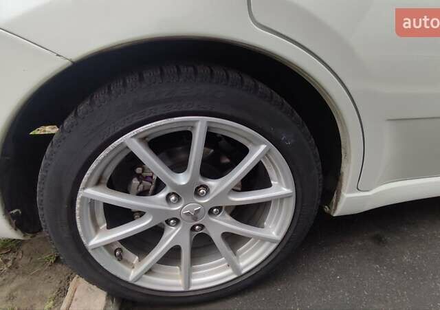 Белый Мицубиси Галант, объемом двигателя 2.4 л и пробегом 205 тыс. км за 7555 $, фото 21 на Automoto.ua