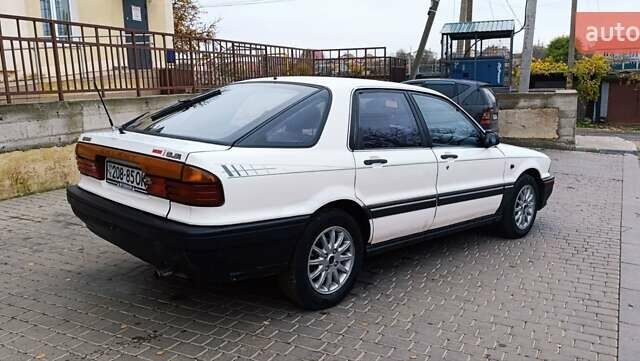 Білий Міцубісі Галант, об'ємом двигуна 2 л та пробігом 400 тис. км за 1500 $, фото 3 на Automoto.ua