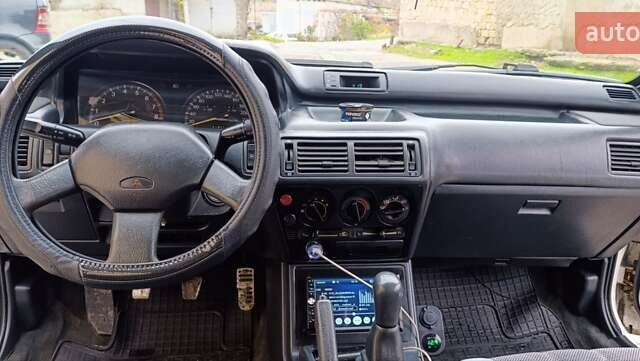 Білий Міцубісі Галант, об'ємом двигуна 2 л та пробігом 400 тис. км за 1500 $, фото 5 на Automoto.ua