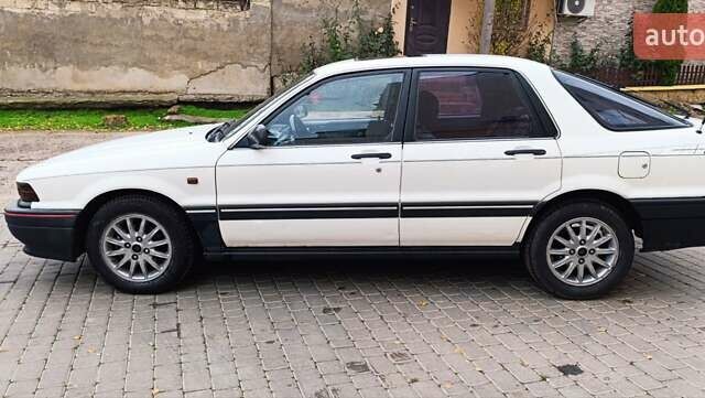 Білий Міцубісі Галант, об'ємом двигуна 2 л та пробігом 400 тис. км за 1500 $, фото 9 на Automoto.ua