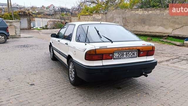 Білий Міцубісі Галант, об'ємом двигуна 2 л та пробігом 400 тис. км за 1500 $, фото 6 на Automoto.ua