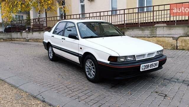 Білий Міцубісі Галант, об'ємом двигуна 2 л та пробігом 400 тис. км за 1500 $, фото 4 на Automoto.ua