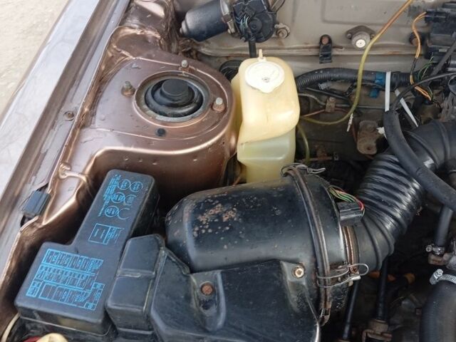 Бежевый Мицубиси Галант, объемом двигателя 2 л и пробегом 500 тыс. км за 1200 $, фото 5 на Automoto.ua