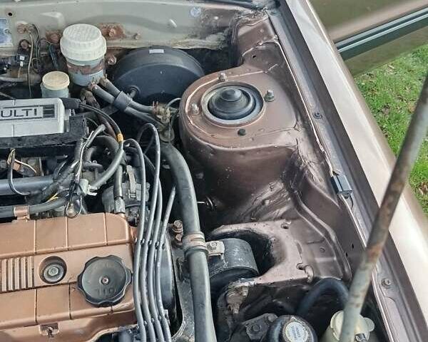 Бежевый Мицубиси Галант, объемом двигателя 2 л и пробегом 500 тыс. км за 1200 $, фото 5 на Automoto.ua