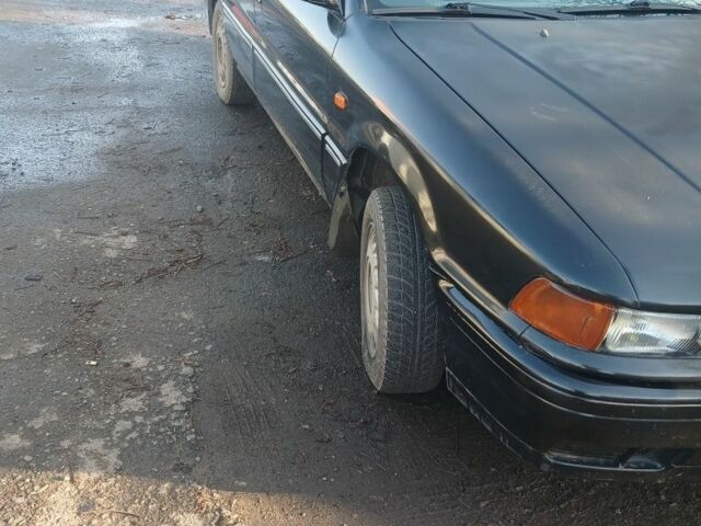 Черный Мицубиси Галант, объемом двигателя 1.8 л и пробегом 279 тыс. км за 1700 $, фото 3 на Automoto.ua