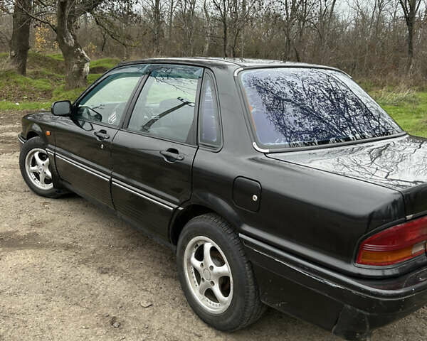 Чорний Міцубісі Галант, об'ємом двигуна 1.8 л та пробігом 354 тис. км за 1400 $, фото 3 на Automoto.ua