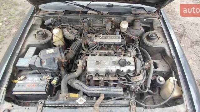 Черный Мицубиси Галант, объемом двигателя 1.8 л и пробегом 441 тыс. км за 1600 $, фото 5 на Automoto.ua