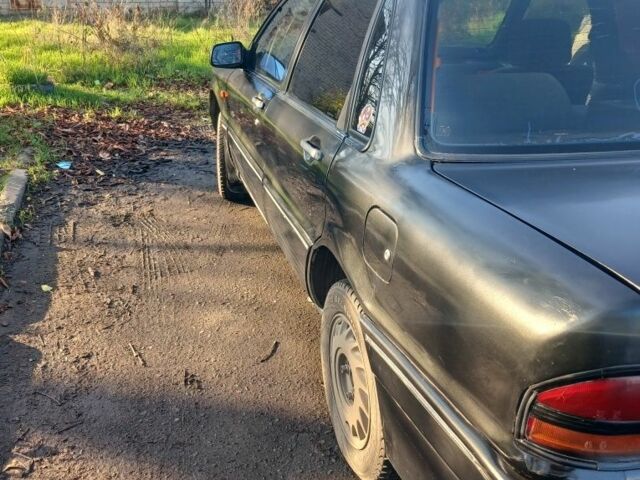 Черный Мицубиси Галант, объемом двигателя 1.8 л и пробегом 279 тыс. км за 1700 $, фото 2 на Automoto.ua