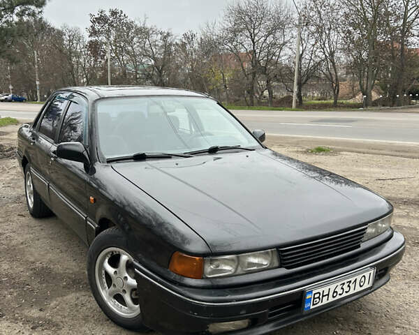 Чорний Міцубісі Галант, об'ємом двигуна 1.8 л та пробігом 354 тис. км за 1400 $, фото 1 на Automoto.ua