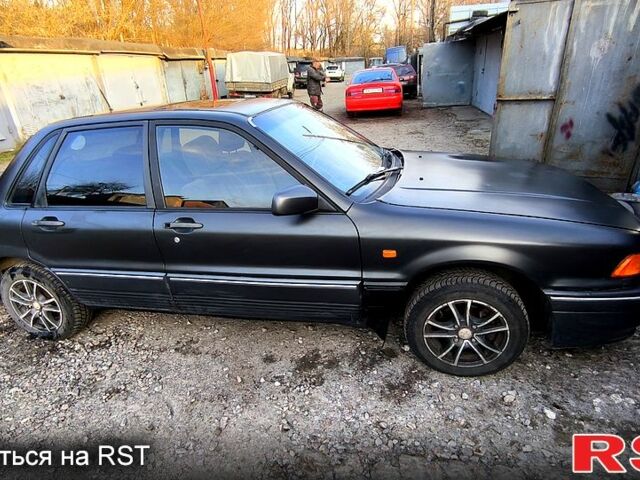 Черный Мицубиси Галант, объемом двигателя 1.8 л и пробегом 300 тыс. км за 1800 $, фото 2 на Automoto.ua