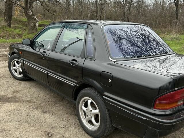 Чорний Міцубісі Галант, об'ємом двигуна 1.8 л та пробігом 354 тис. км за 1400 $, фото 3 на Automoto.ua