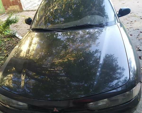 Черный Мицубиси Галант, объемом двигателя 2 л и пробегом 160 тыс. км за 3000 $, фото 2 на Automoto.ua