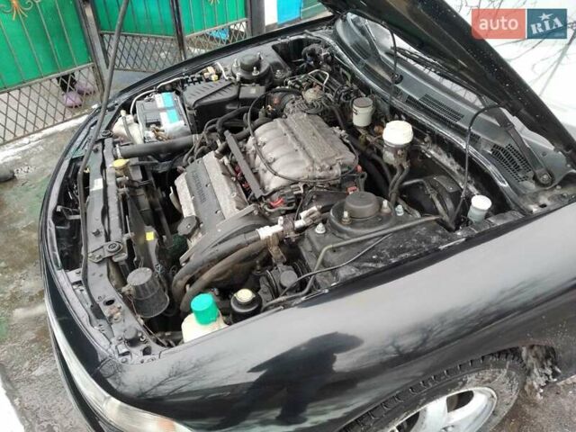Черный Мицубиси Галант, объемом двигателя 2 л и пробегом 160 тыс. км за 3000 $, фото 3 на Automoto.ua