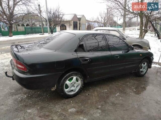 Черный Мицубиси Галант, объемом двигателя 2 л и пробегом 160 тыс. км за 3000 $, фото 5 на Automoto.ua