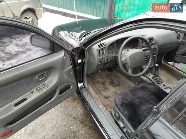 Черный Мицубиси Галант, объемом двигателя 2 л и пробегом 160 тыс. км за 3000 $, фото 7 на Automoto.ua