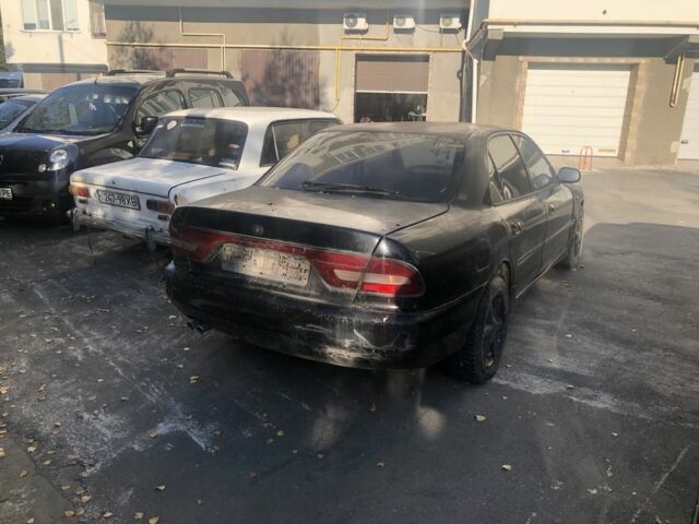 Черный Мицубиси Галант, объемом двигателя 2 л и пробегом 84 тыс. км за 900 $, фото 3 на Automoto.ua