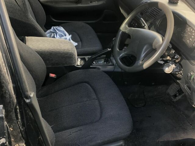 Черный Мицубиси Галант, объемом двигателя 2 л и пробегом 84 тыс. км за 900 $, фото 4 на Automoto.ua